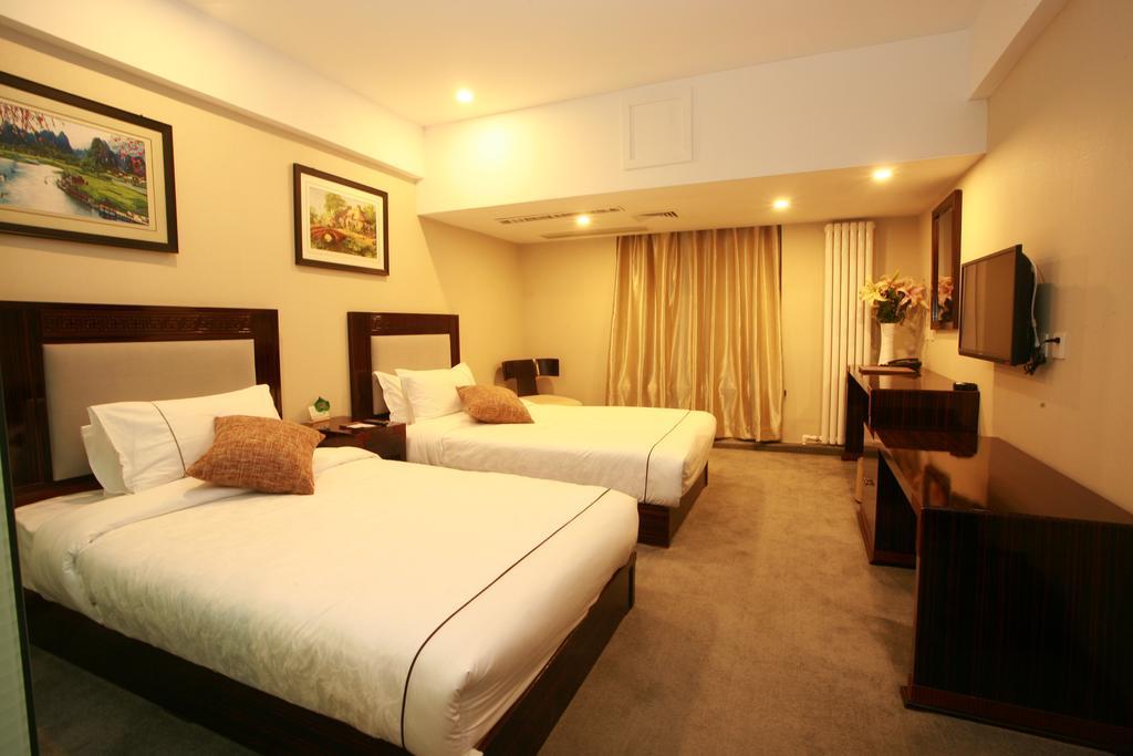 Harbin Yakelai Holiday Hotel Habitación foto