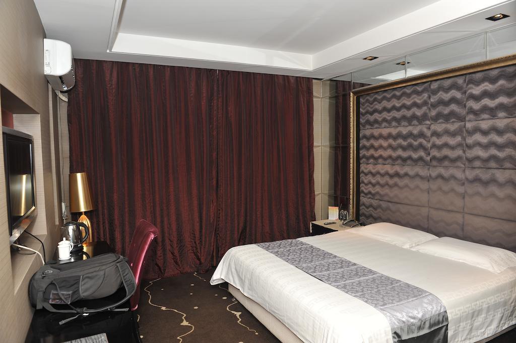 Harbin Yakelai Holiday Hotel Habitación foto