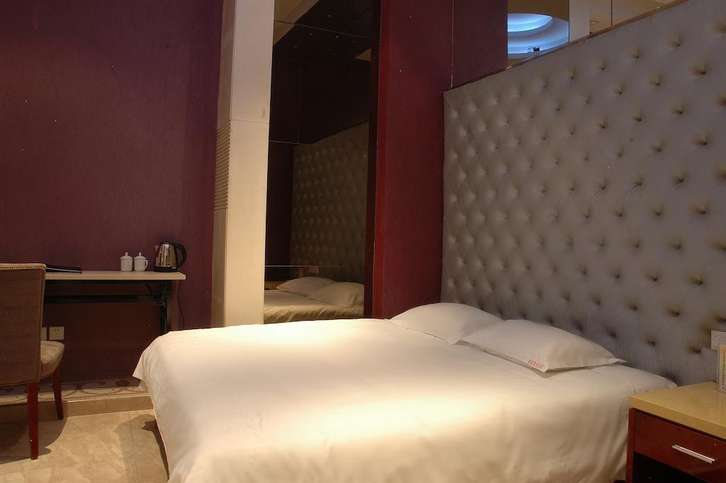 Harbin Yakelai Holiday Hotel Habitación foto