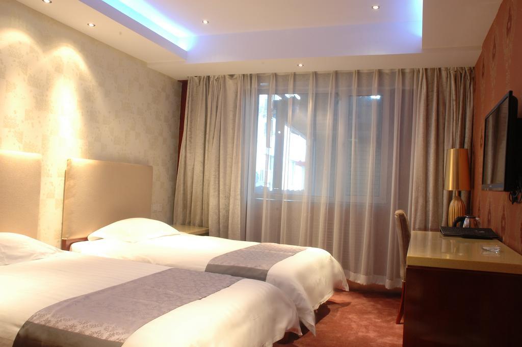 Harbin Yakelai Holiday Hotel Habitación foto