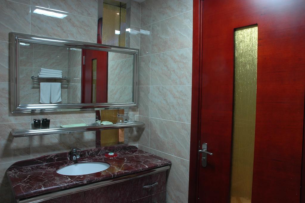 Harbin Yakelai Holiday Hotel Habitación foto