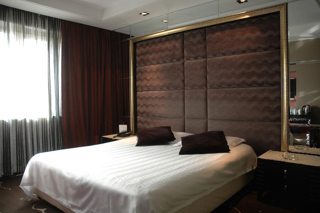 Harbin Yakelai Holiday Hotel Habitación foto