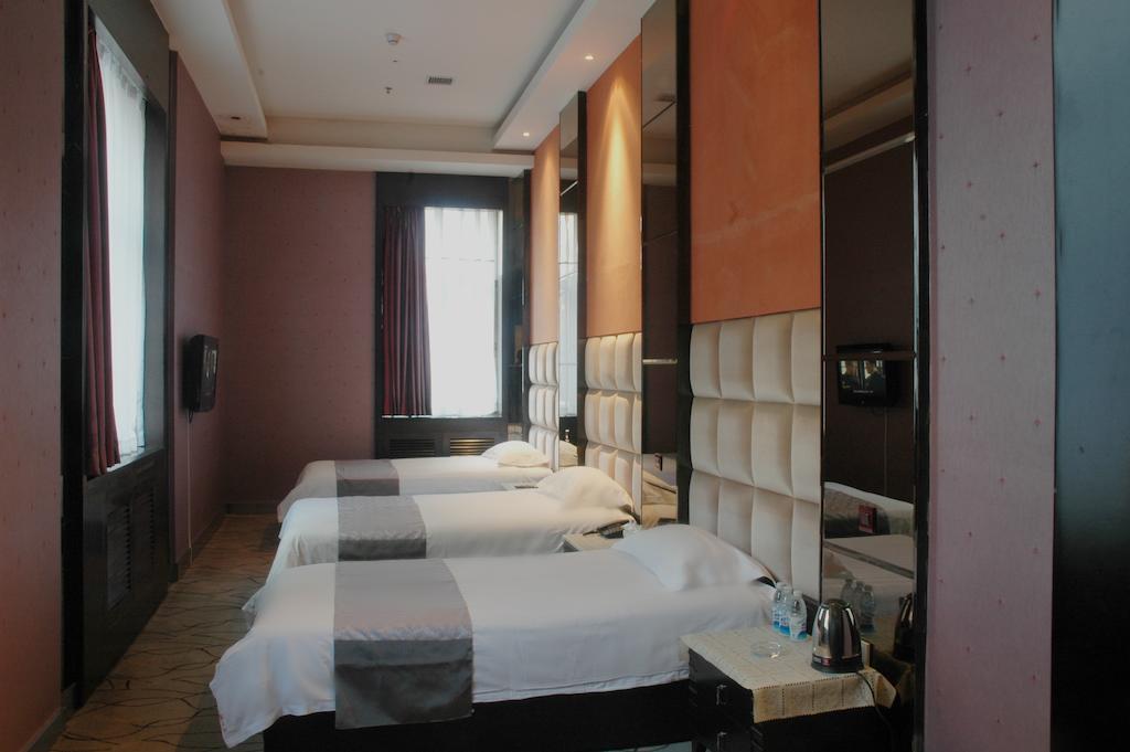Harbin Yakelai Holiday Hotel Habitación foto