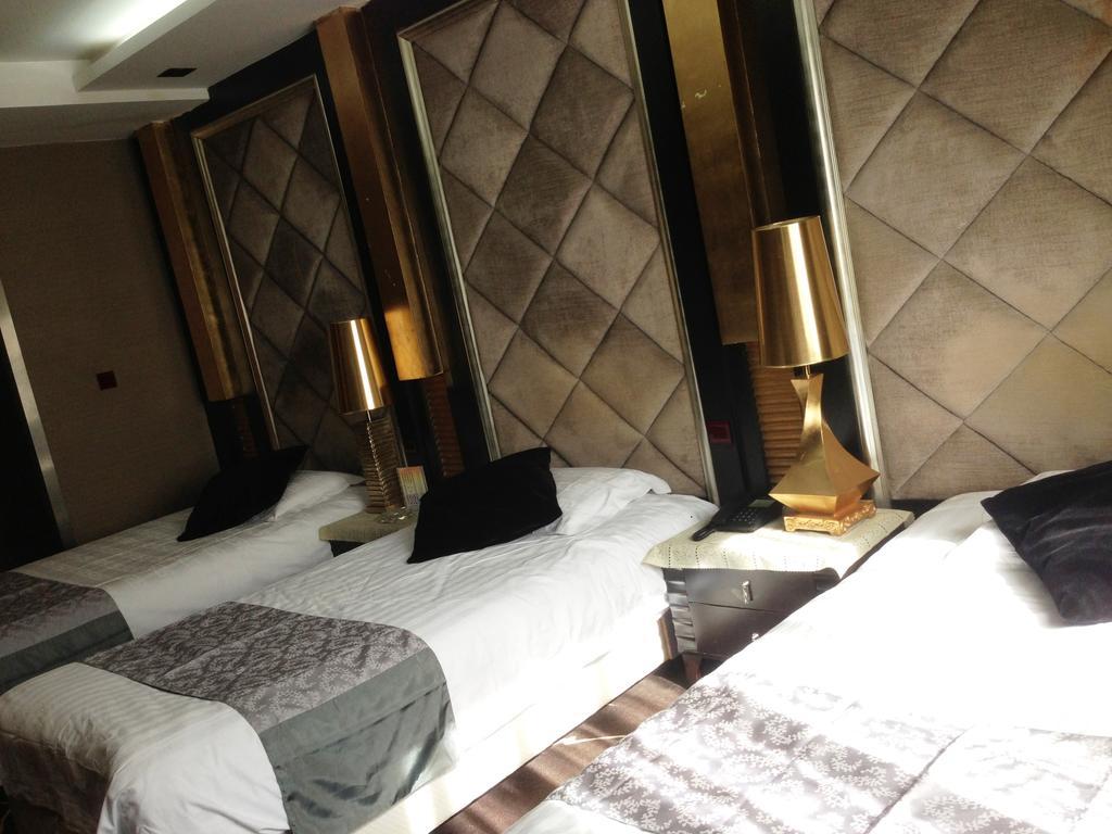 Harbin Yakelai Holiday Hotel Habitación foto