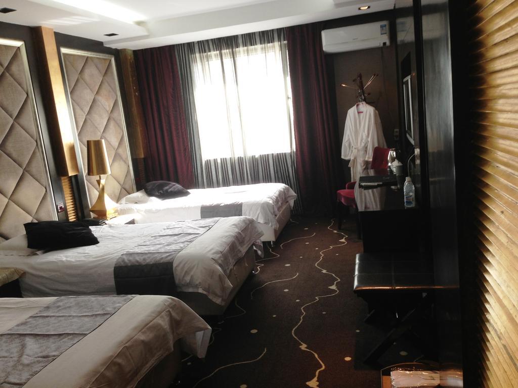 Harbin Yakelai Holiday Hotel Habitación foto