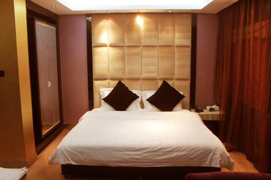 Harbin Yakelai Holiday Hotel Habitación foto