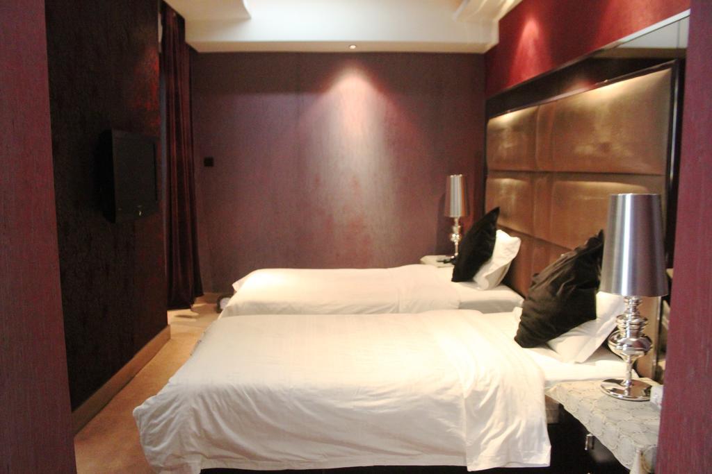 Harbin Yakelai Holiday Hotel Habitación foto