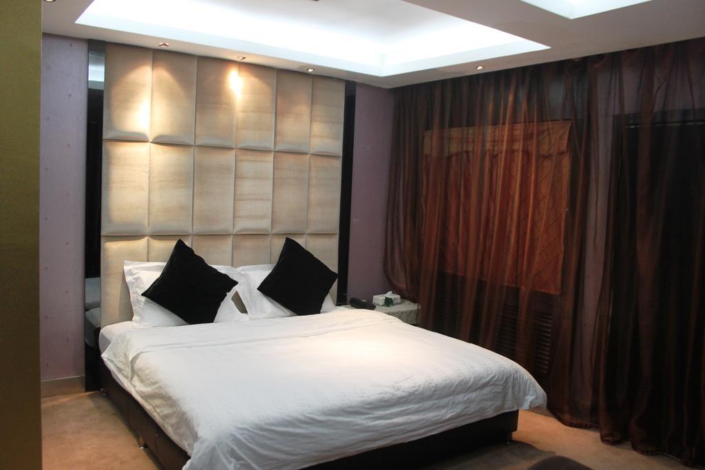 Harbin Yakelai Holiday Hotel Habitación foto